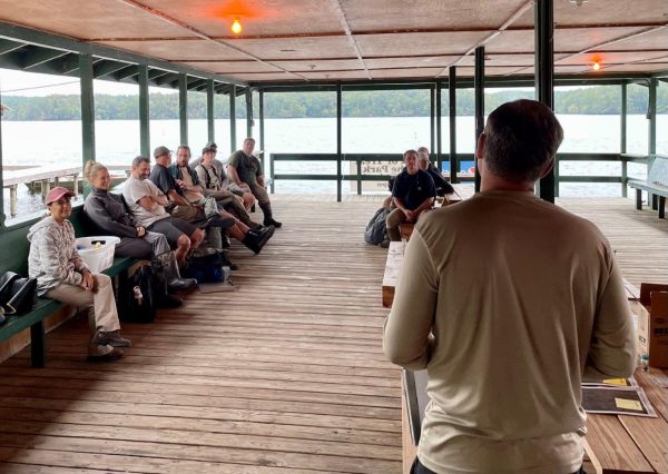 Chad Fitch briefs biologists