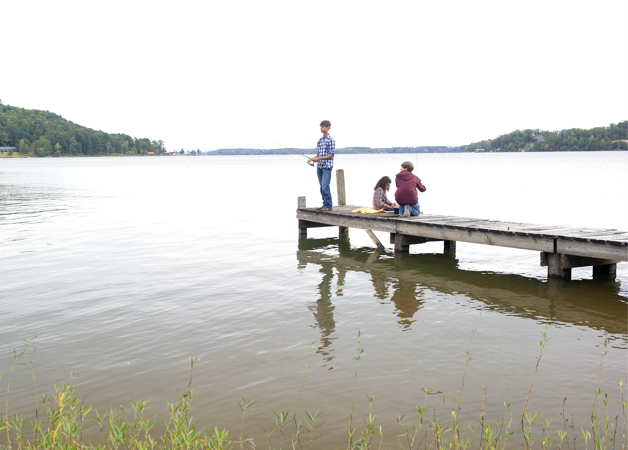 Kids fishing on Weiss Lake.