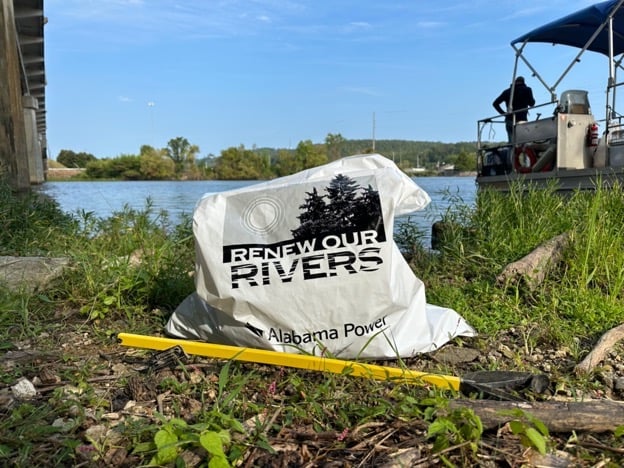 One of the many bags of trash collected by volunteers during a recent Renew Our Rivers cleanup on Neely Henry Lake. (Joey Blackwell / Alabama News Center)